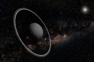 Artist conception of the ring system discovered around the asteroid Chariklo. Credit: Lucie Maquet