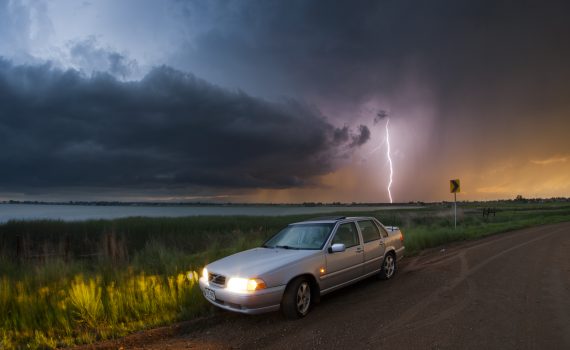 Lightning and a car. Photo Credit: Bryce Bradford