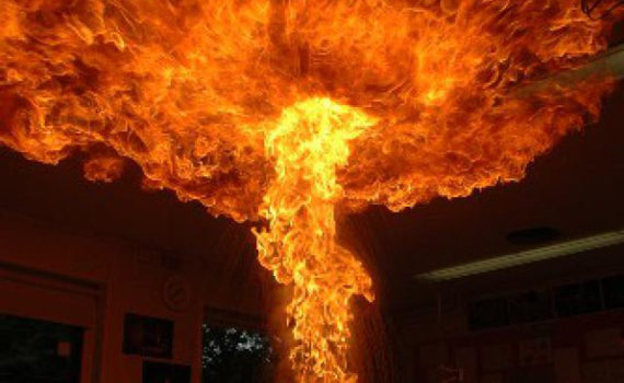 Chip pan fire demonstration in a laboratory.