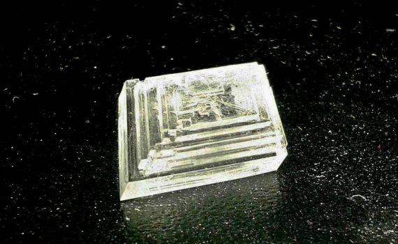 Sodium nitrate crystals grow Hopper (step-ladder) faces in the trigonal system.