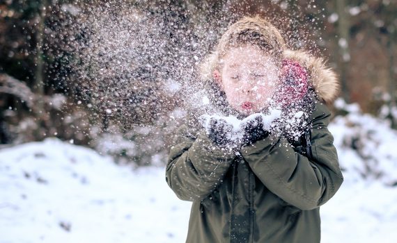 Boy Playing With Real Snow